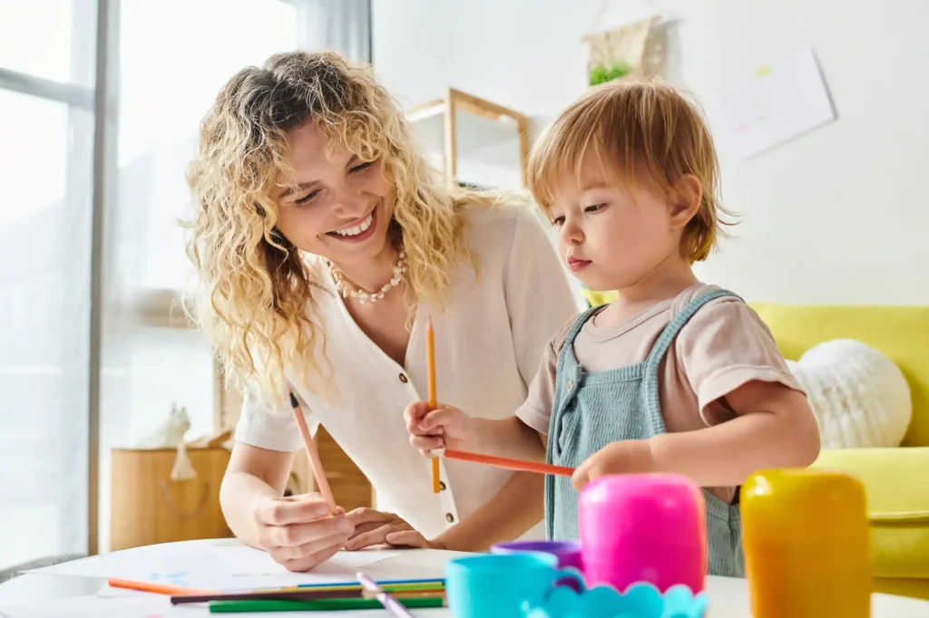 a childcare educator with a child