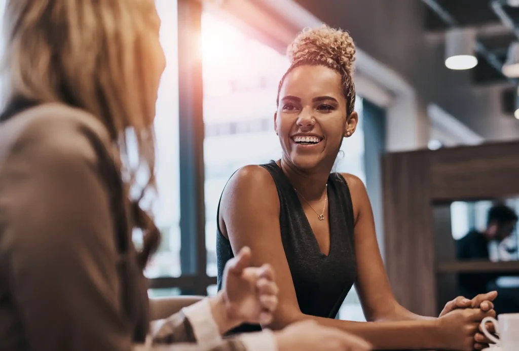 Real estate agent with clients talking about a property