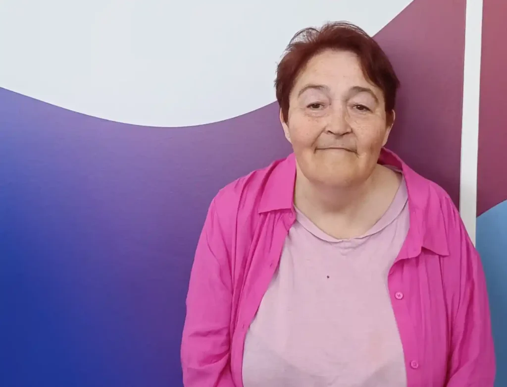 Photo of Linda, a participant, finding new purpose at AKG